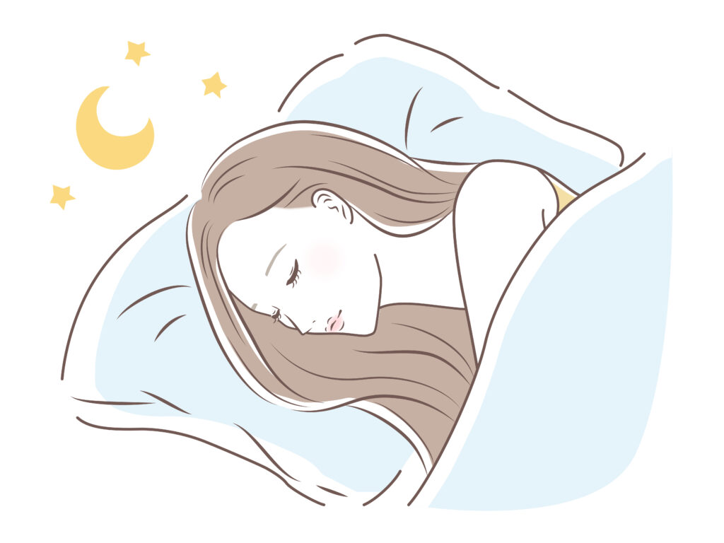 枕を使って寝る女性