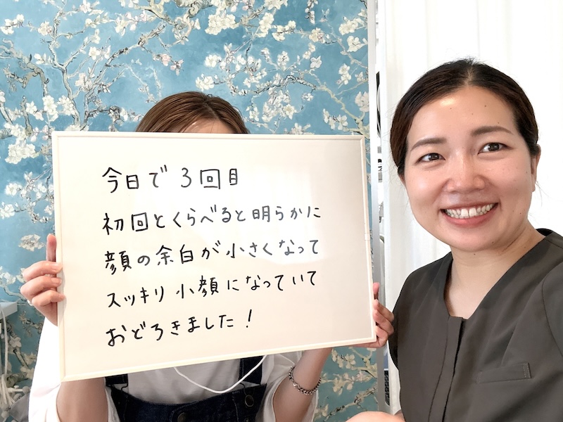 お客様のコメントボード2ショット写真